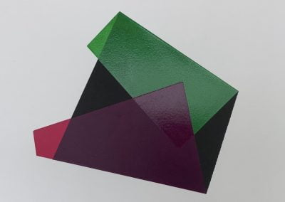 Abstract geometric shapes in green, purple, red.